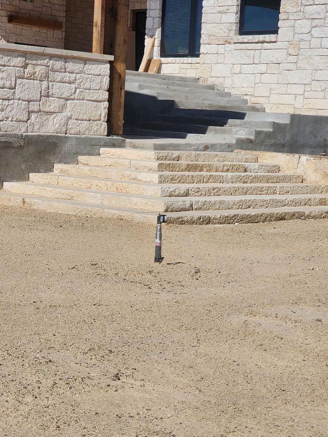Stone-clad entry with limestone steps