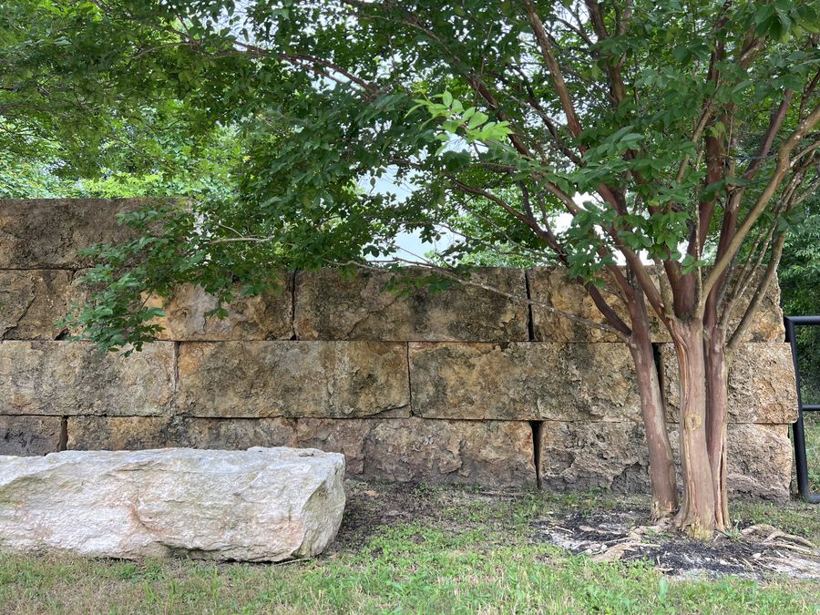 Stacked limestone block wall